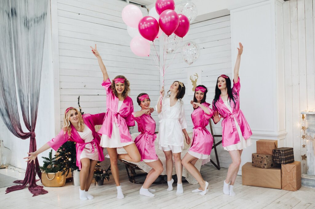 Bridesmaids and bride having fun at bachelorette party